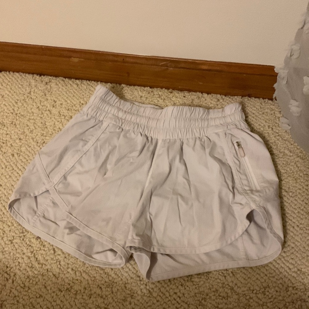 white lululemon track that shorts 4in sz4